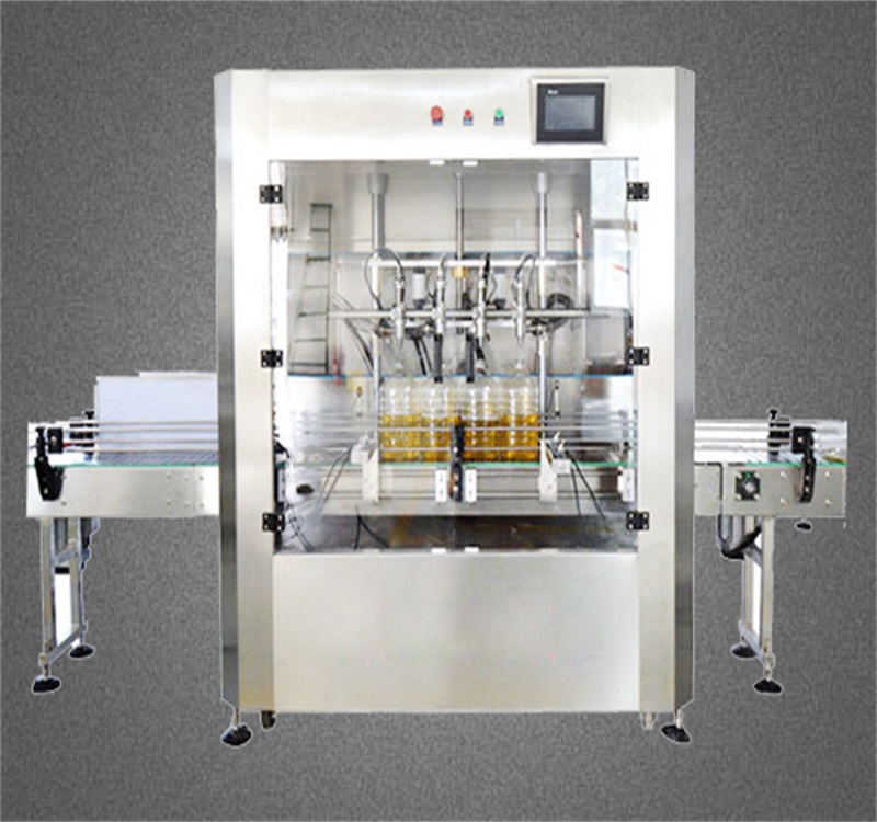 全自動(dòng)四頭玉米油灌裝機(jī)1.jpg 全自動(dòng)四頭玉米油灌裝機(jī)1.jpg